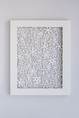 White winterphoto frame with decorative snowflakes.