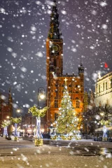Deurstickers Beautiful Christmas tree in the old town of Gdansk at snowy night. Poland © Patryk Kosmider