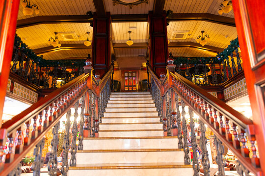 Front staircase in an expensive restaurant. Luxurious interior of traditional English restaurant