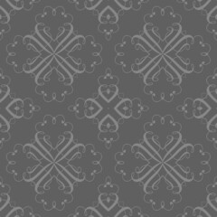 Embossed seamless background with delicate pattern...Texture as a background. Embossed seamless pattern...Structured regular sample...