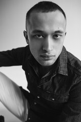 Obraz premium Handsome young man model in studio on isolated background