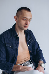 Obraz premium Handsome young man model in studio on isolated background