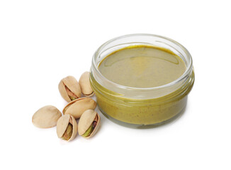 Jar with delicious pistachio butter and nuts on white background