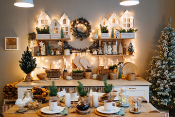 electric garlands on decorated in kitchen for new year. Christmas decor.