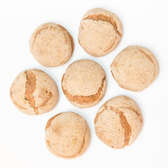 Homemade gluten-free bread buns on white background