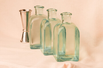 alcohol in a bottle, transparent cocktail, on a white background, the bartender prepares a cocktail