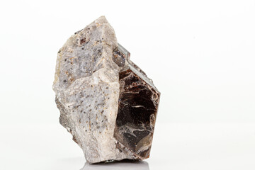 Macro of a mineral stone Vesuvianite on a white background