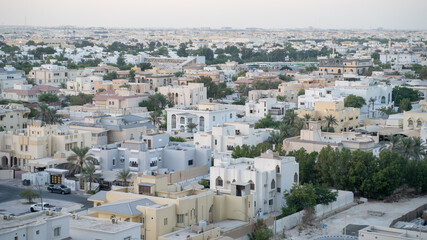 doha city bird view during the day time , onaiza residential area.