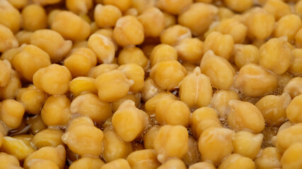 Boiled chickpeas close up. Process cooking snack with chickpeas