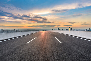 Panoramic skyline and buildings with empty road