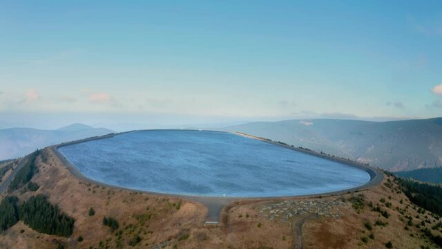 Pumped water storage hydroelectric plant reservoir aerial view