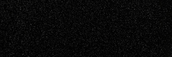 Black and white sparkling glitter bokeh background, christmas shiny texture. Holiday lights....