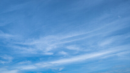 Naklejka na ściany i meble background view of cloud formation on a sunny day