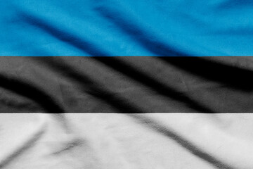 Estonian flag on wavy fabric.
