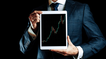 Stock broker. Investment business technology app on digital screen in businessman hands. Finance application for sell, buy and analysis profit dividend statistics. Account profit banner.