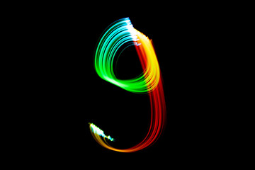 Letter G. Isolated figure on a black background. Freezelight.