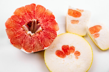 Sliced red grapefruit, texture of pulp.