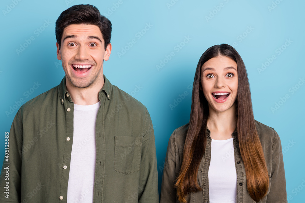 Poster Photo of impressed spouses lady guy hear incredible novelty scream isolated over blue color background