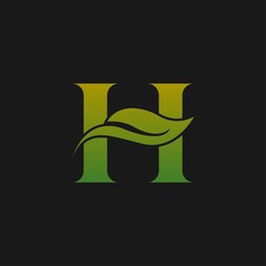 Green eco letters H logo with leaves. symbol alphabet botanical natural