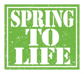 SPRING TO LIFE, text written on green stamp sign