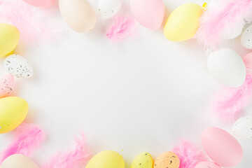 Naklejka na ściany i meble Flatlay of Easter eggs and feathers