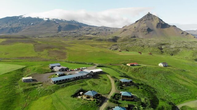 Aerial view of Snaefellsnes peninsula at sunset, Iceland. Aerial view of Arnarstapi. Slow motion