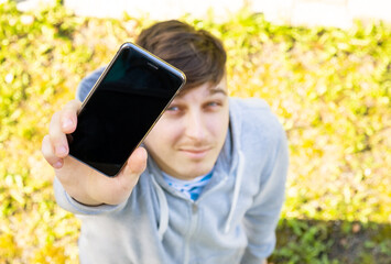 Young Man with a Phone