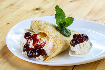 Pancake with cottage cheese and jam