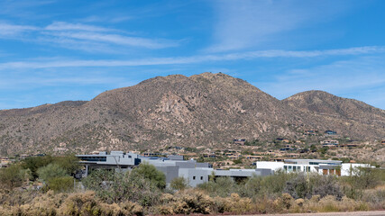 Houses a the bottom of a mountain in the Sonoran desert