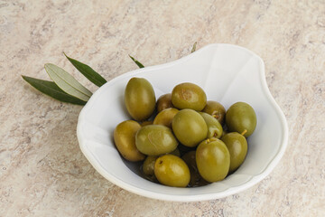 Tasty marinated olives in the bowl