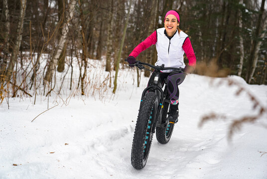 Women Mountain Biking on Fat Bikes in the winter