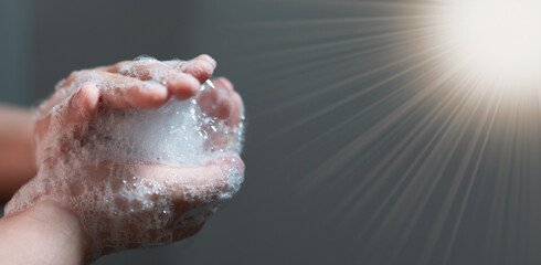 hand hold bubbles in palm with light