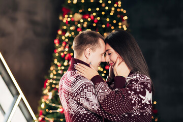 couple in love near christmas tree