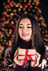 girl with a new year gift