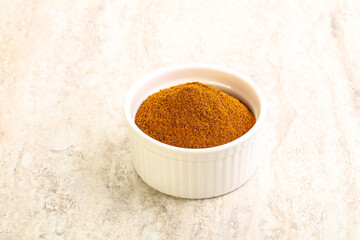 Dry Paprika powder in the bowl