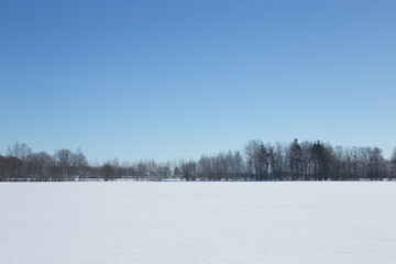 Winter landscape, blue skies and sparkling snow