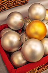 A box with Christmas tree glass balls close-up