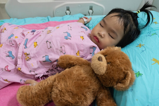 A little asian girl is sick in the hospital,Kawasaki disease