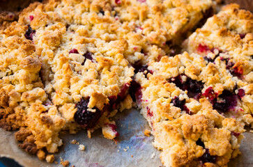 Homemade berries crumble in macro. Food backround.