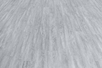 Laminate background. Natural wood texture. The flooring is made of gray planks, panels. The parquet...