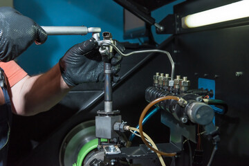 Fototapeta na wymiar Repair of diesel car injectors.
