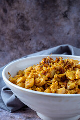 Stir fried chicken in white plate