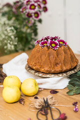 Still life with an apple sponge cakes.