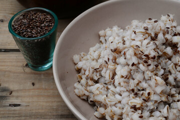 traditional russian food - barley porridge with flax seed close up