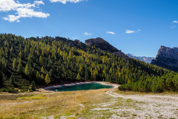 A reservoir for artificial snow production. Belluno Province, Dolomiti Alps, Italy