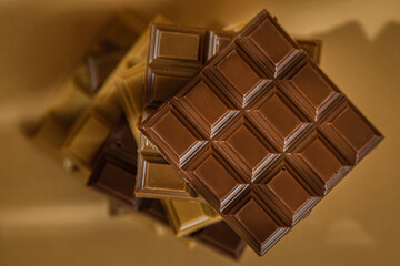 chocolate bar on brown background