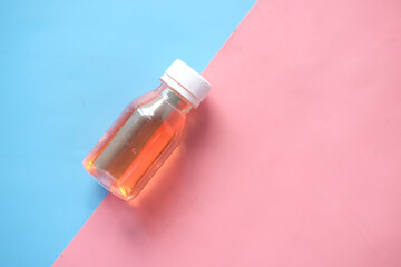 bottle with liquid medicine on white ,