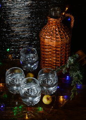christmass still life with gin at bottle and glasses