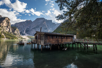 Naklejka premium Sunny day on Lake Braies in Dolomites in Italy