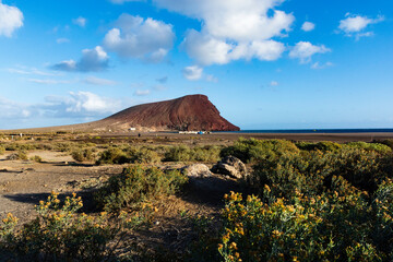 La Tejita beach, Tenerife, Canary Islands. The red mountain in the background. Canarian seascape
